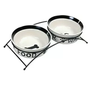 Trixie TX-24641 керамічні миски на підставці 2 × 0,6 л / ø 15 см Trixie TX-24641 керамічні миски на підставці 2 × 0,6 л / ø 15 см